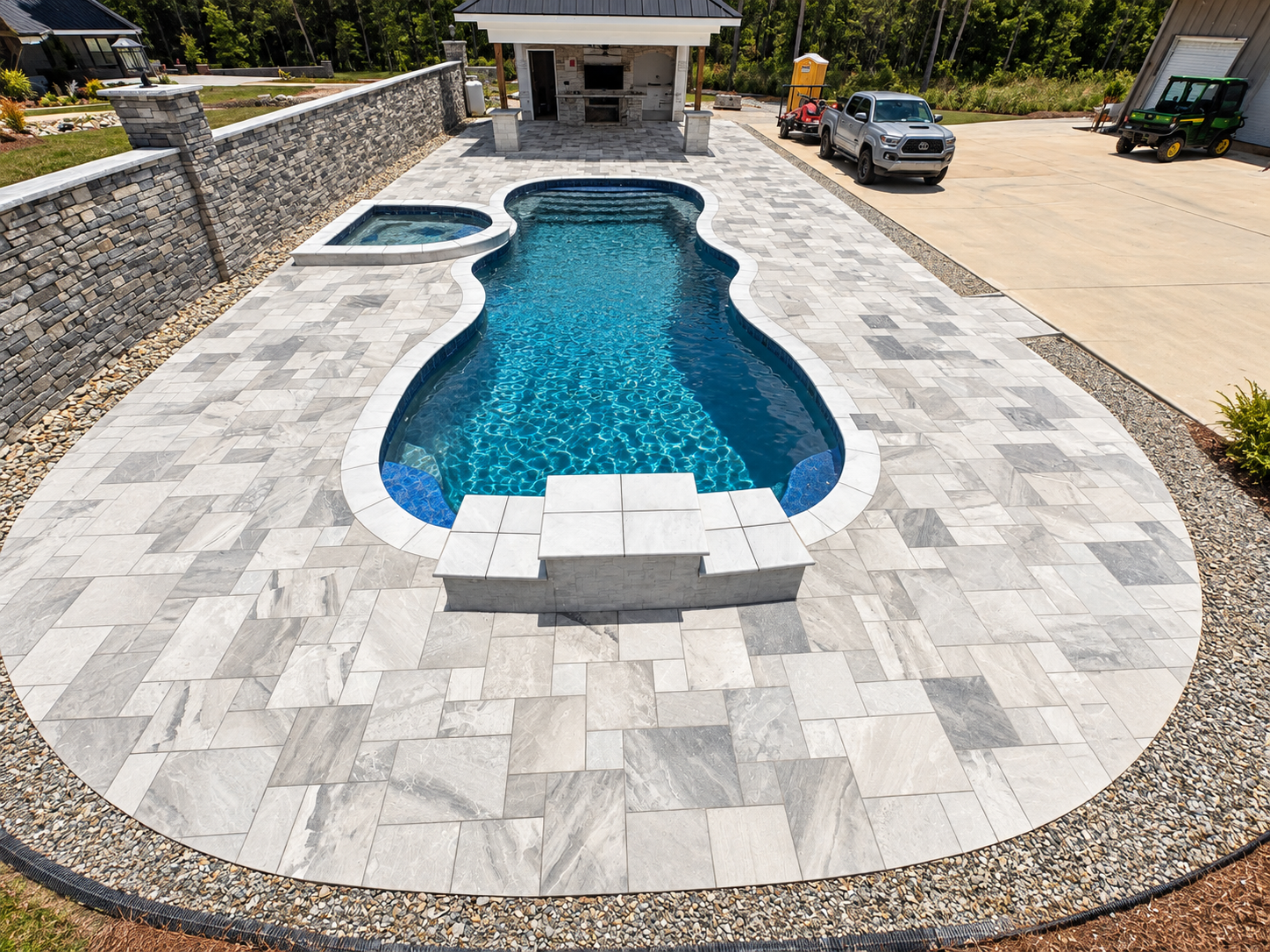 J&I Outdoor Living poolside hardscape project